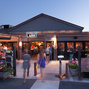 Two women walking into the Lark restaurant in Santa Barbara's Funk Zone