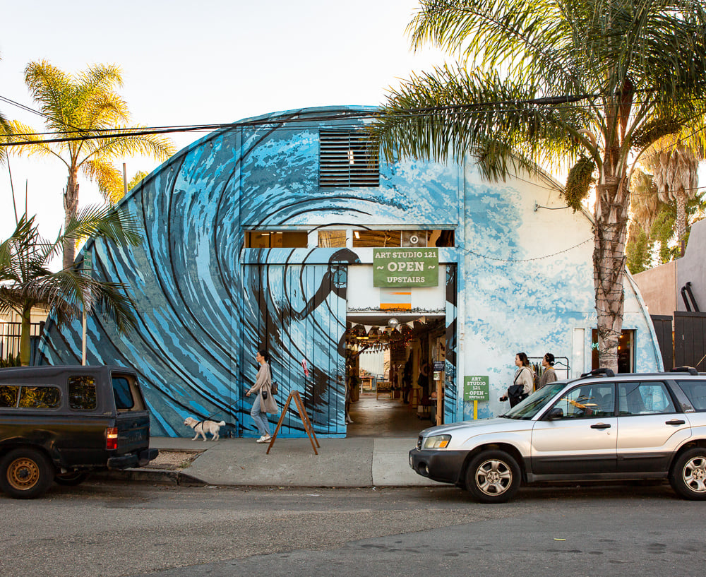 Iconic mural on a Funk Zone warehouse celebrating the district’s eclectic spirit and adaptive public space design.