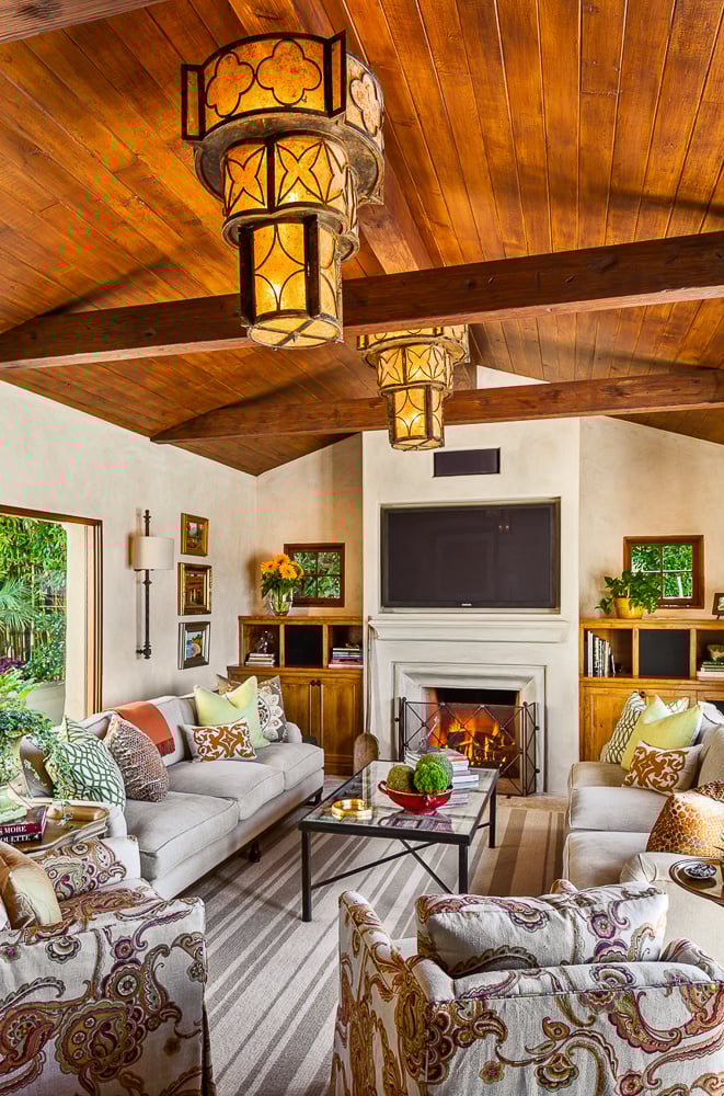 Warm interior with exposed beams and plaster walls exemplifies traditional home design and timeless architectural heritage.