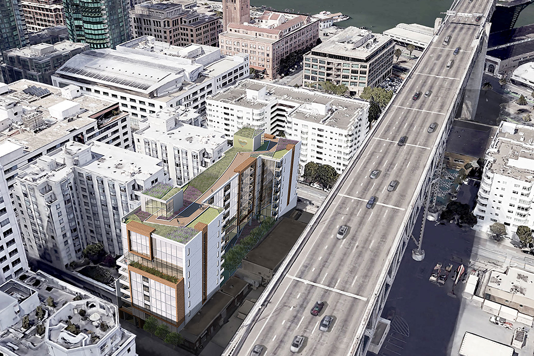 Aerial perspective of the multifamily housing project featuring green roofs and sustainable urban infill strategies.