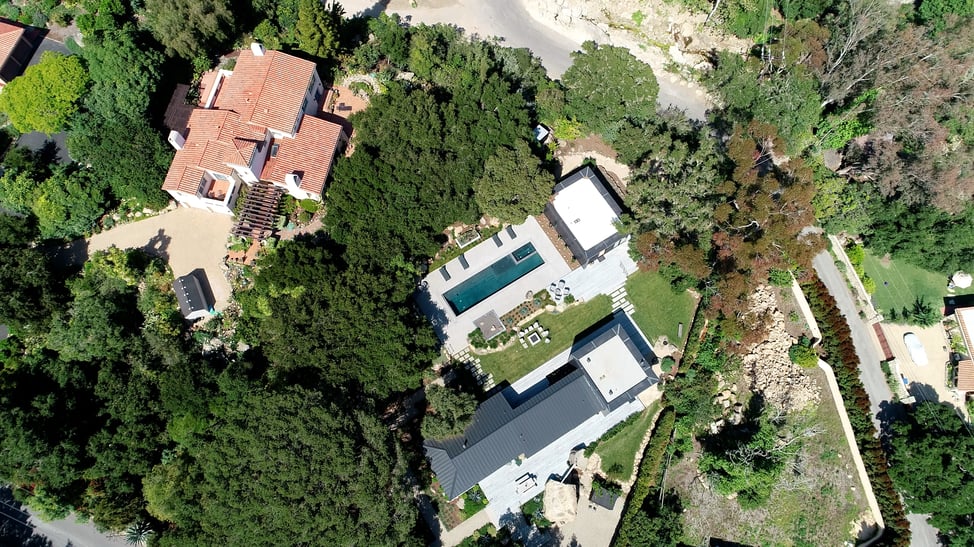 Bird’s-eye view of a Santa Barbara estate showcasing how residential real estate can accommodate modern house design alongside traditional homes.