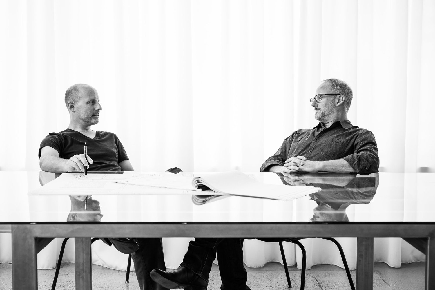 AB design studio co-founders Clay Aurell and Josh Blumer collaborating on a restaurant design concept.