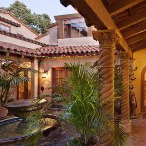 Courtyard with water feature surrounded by columns in Moresque style