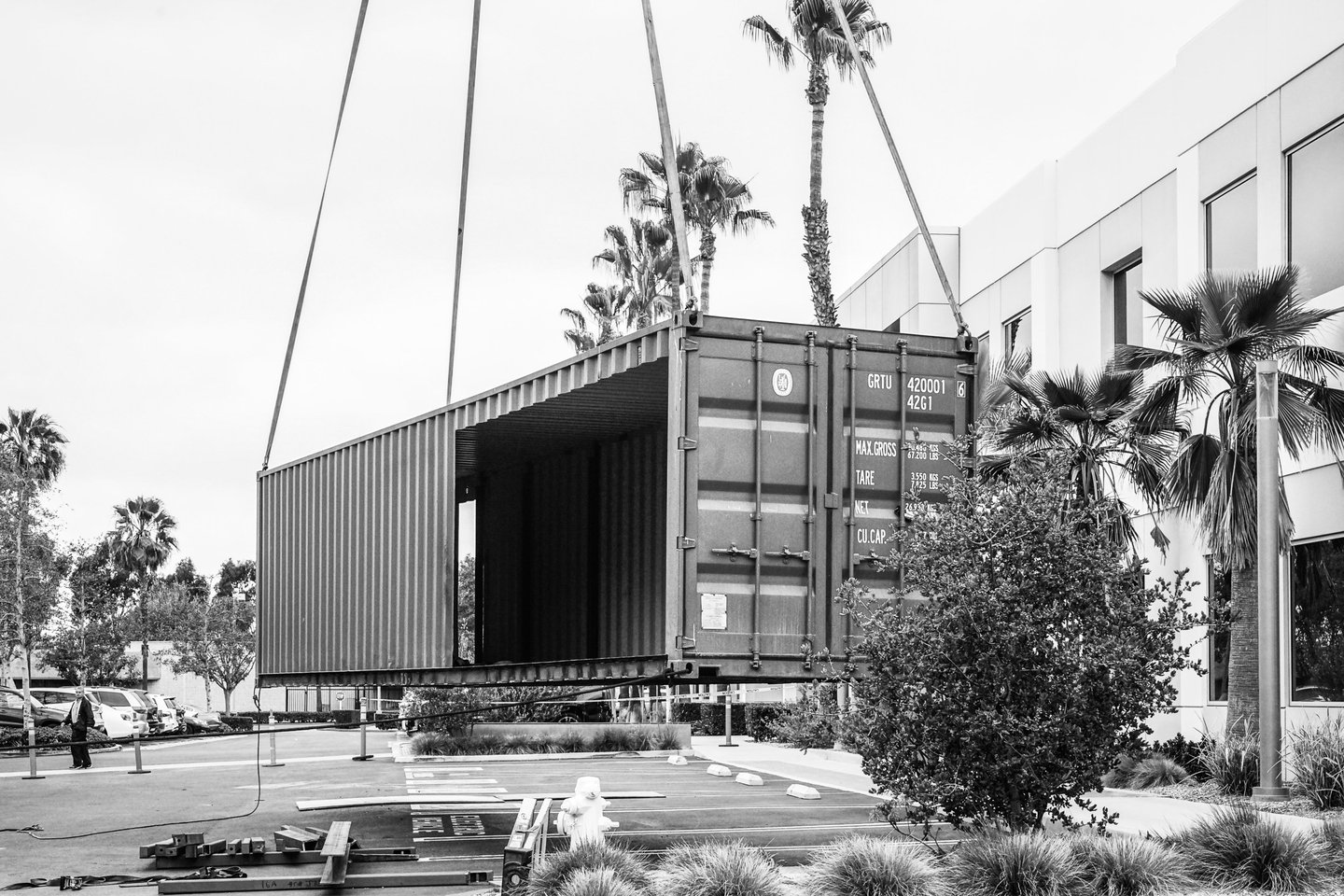 Container Pavilion at Intersect-16-shipping container being craned in