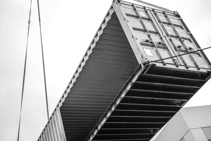 Container Pavilion at Intersect-18-shipping container being craned in