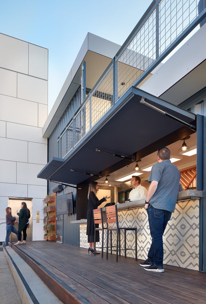 Container Pavilion at Intersect-9-people enjoying beer and wine tenant