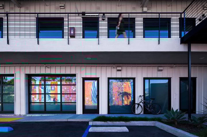 Soco Commercial-3-store front facade with mural reflection