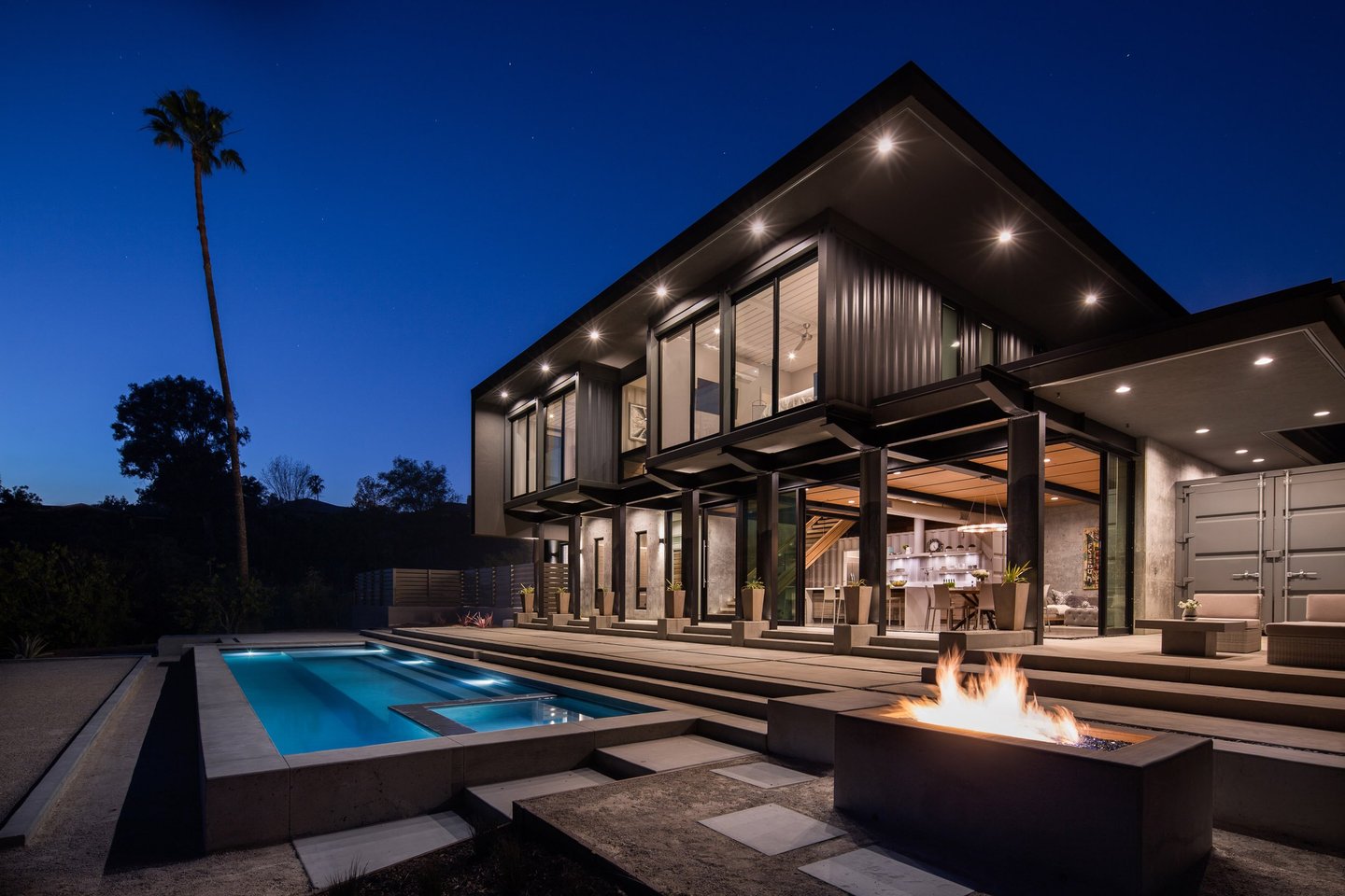Shipping Container Residence-2-south west elevation with pool and fire pit