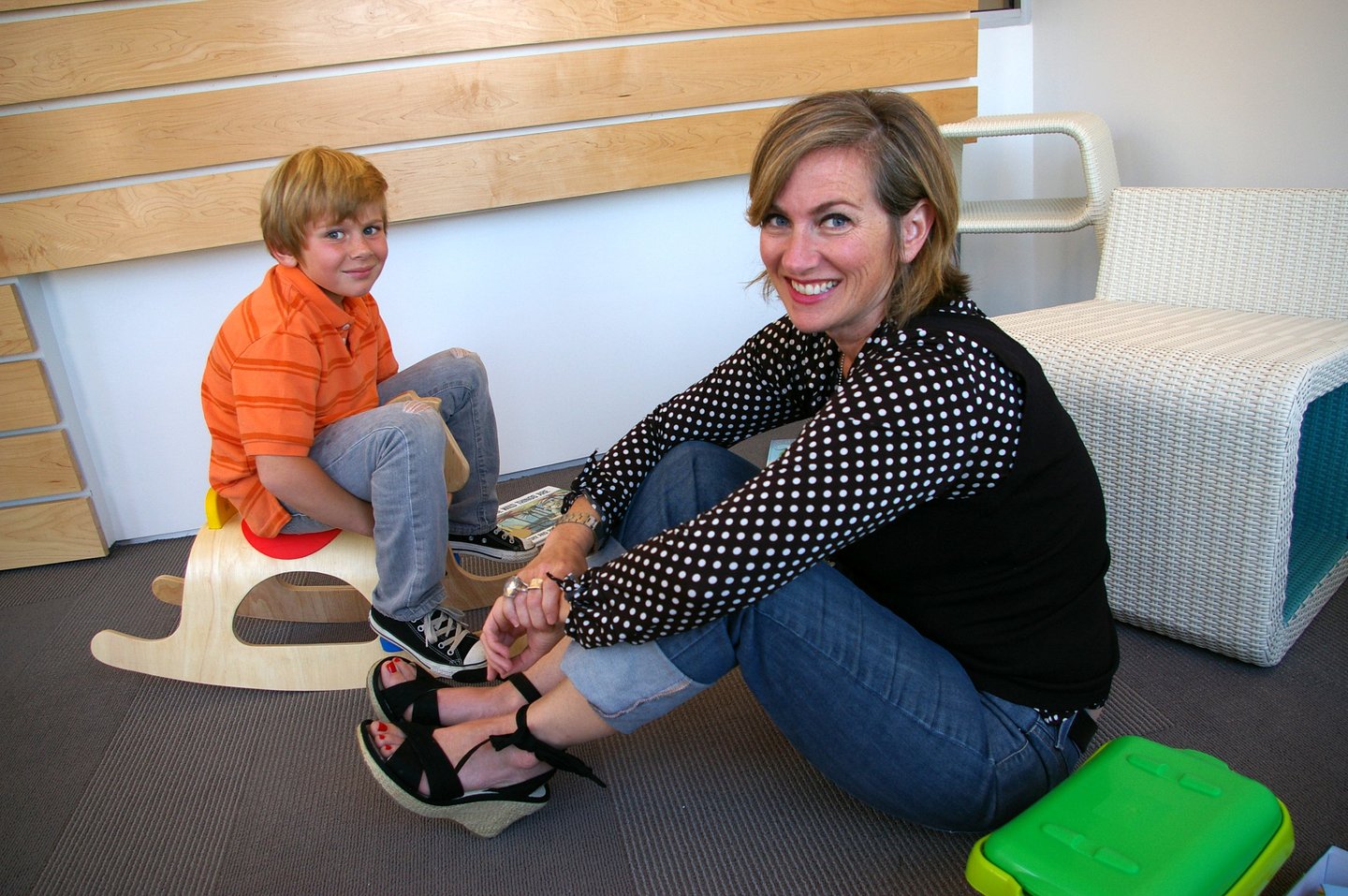 Sugarbug Dental-@2x-8 Mom and son smiling at reception desk